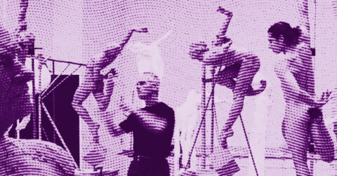 A person stands among multiple abstract sculptures of human figures with raised arms. The image has a purple hue and a dotted, textured overlay, creating a stylized, artistic effect. © Illustration by ArtCritic.