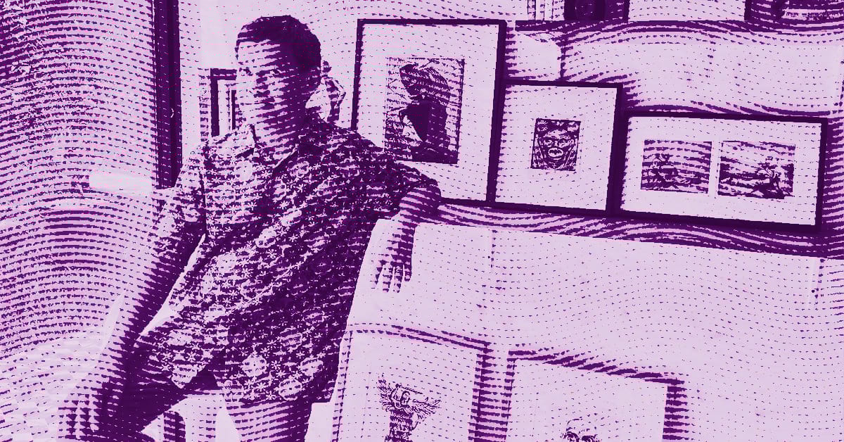 A person in a patterned shirt stands indoors, leaning on a surface in front of a display of framed artwork and photographs. The image has a purple halftone effect, giving it a stylized, textured look. © Illustration by ArtCritic.