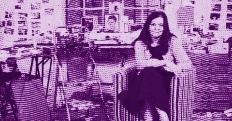 A woman sits in a striped armchair with legs crossed, arms folded, in front of a cluttered desk and shelves. The image is tinted purple and has a wavy, patterned overlay. © Illustration by ArtCritic.