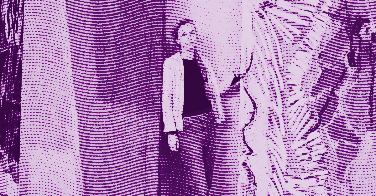 A person stands amidst large, abstract, wavy patterns in shades of purple, with a textured, dotted overlay effect across the entire image. © Illustration by ArtCritic.