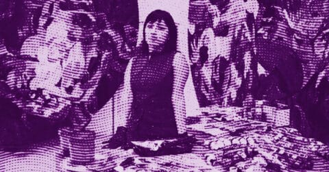A stylized, purple-toned image of a person standing behind a table covered with various items, with more people and objects visible in the background, rendered in a halftone dot pattern. © Illustration by ArtCritic.