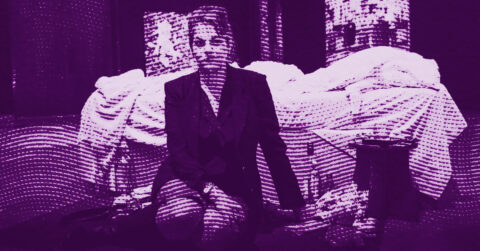 A person in a suit sits on the floor in front of a bed covered with rumpled sheets. The image has a purple tint with a dotted pattern overlay, creating a stylized, abstract effect. © Illustration by ArtCritic.