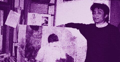 A stylized, purple-tinted image shows a man standing beside a seated person in a room filled with books and artwork. The image has a textured, halftone effect. © Illustration by ArtCritic.