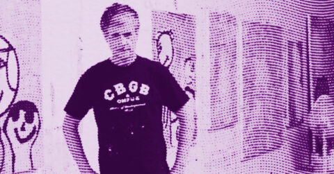 A person stands in front of abstract artwork displayed on a wall. The image has a purple, halftone filter effect, giving it a stylized, textured appearance. The person wears a dark T-shirt with text on the front. © Illustration by ArtCritic.