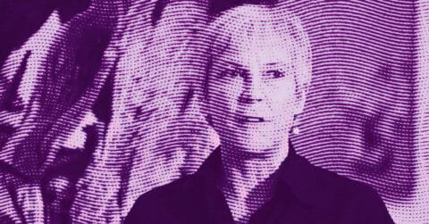 A halftone-style purple-toned image of a person with short hair, facing forward and smiling slightly. The image has wavy lines and a textured pattern throughout. © Illustration by ArtCritic.