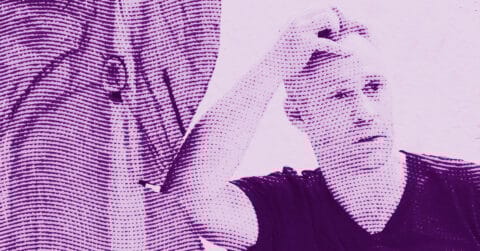 A man with a serious expression sits with his hand resting on his head. The image has a purple tint and a dotted, textured pattern overlay. © Illustration by ArtCritic.