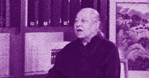 A stylized, purple-toned image shows a person sitting indoors, with a curtain and bookshelf behind them. The image uses a halftone dot pattern, giving it a textured, graphic appearance. © Illustration by ArtCritic.