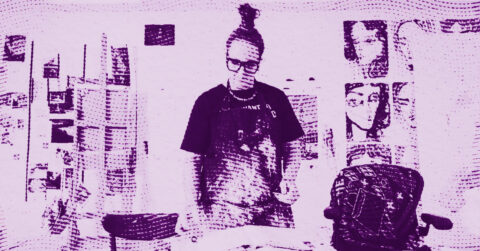 A person with glasses and a top-knot stands in an art studio, surrounded by paintings and art supplies. The image has a purple halftone effect. © Illustration by ArtCritic.