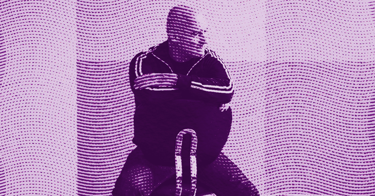 A stylized, purple-toned image of Jim Hodges with crossed arms leaning on the back of a chair, overlaid with a pattern of wavy dotted lines. © Illustration by ArtCritic.