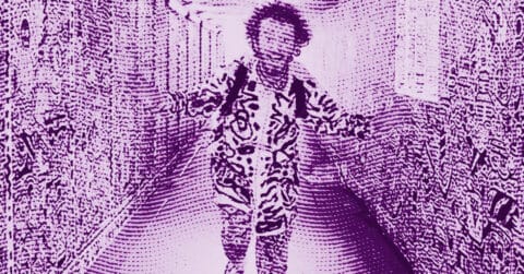 Mr Doodle with curly hair stands in a hallway covered in intricate, graffiti-like patterns. The entire image is tinted purple, giving it a stylized, artistic effect. © Illustration by ArtCritic.