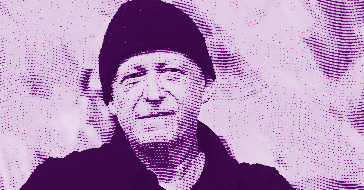An artistic, purple-toned image of Herbert Brandl wearing a dark beanie and shirt, with a textured, dotted overlay pattern across the entire image, creating a stylized and abstract effect. © Illustration by Art Critic.
