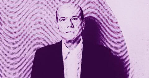 A stylized, pink-toned image of Nicola De Maria in a suit with a neutral expression. The image features dotted, wavy patterns overlaying the photo, creating a textured, artistic effect. © Illustration by Art Critic.