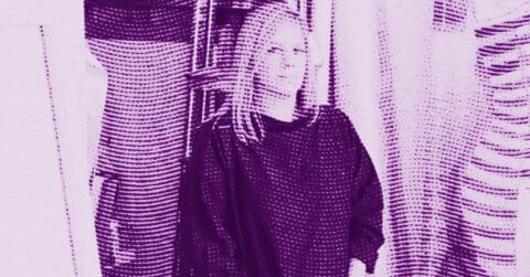 Lisa Brice with straight hair and a somber expression sits indoors, partially obscured by curtains. The image has a purple, halftone filter effect. © Illustration by Art Critic.