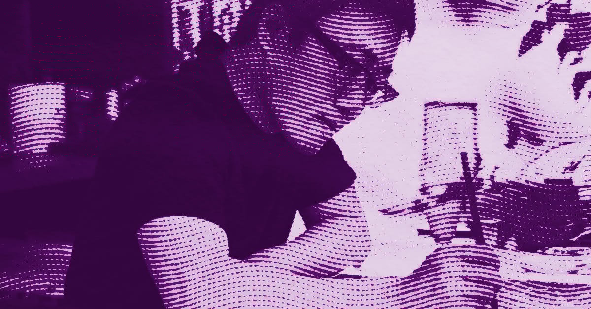 Ren Zhong wearing glasses, head down and focused, appears to be writing or drawing at a desk. The image is tinted purple with a dotted halftone effect and stylized lighting. © Illustration by Art Critic.
