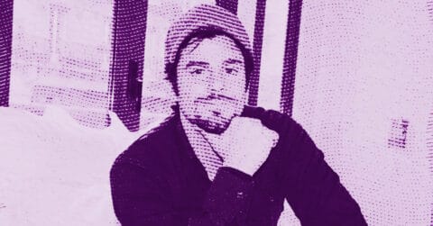 Philippe Shangti wearing a beanie and a dark shirt sits indoors with his hand resting on his chin. The photo has a purple filter and a dotted halftone effect. © Illustration by Art Critic.