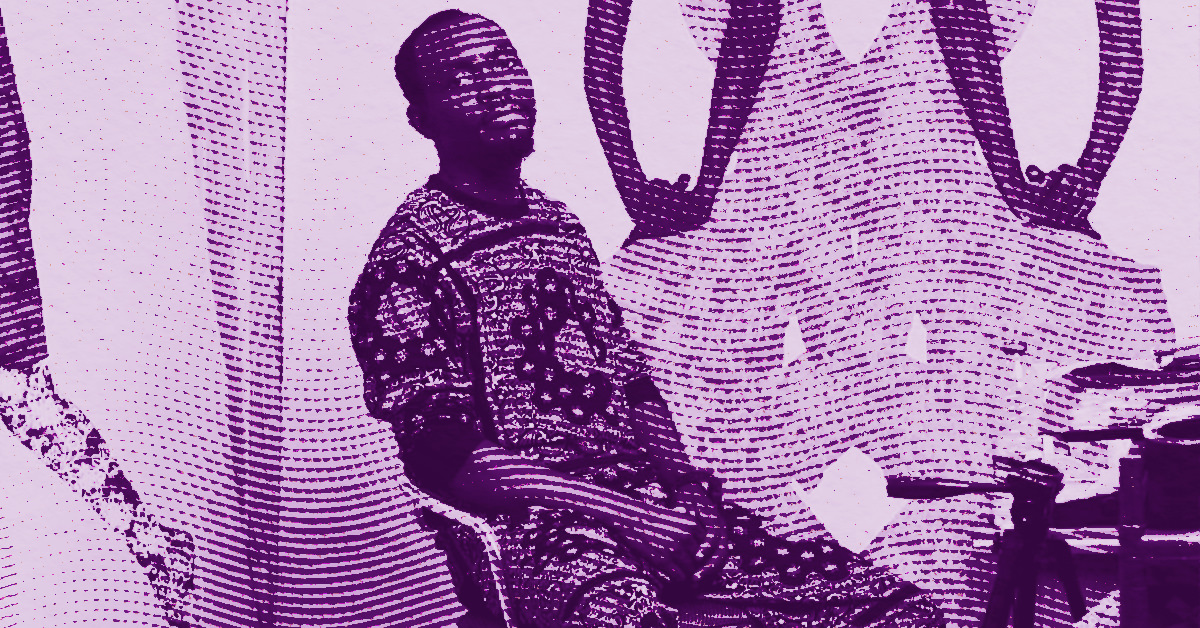 Emmanuel Taku in patterned clothing sits on a plastic chair beside a table, in a room with intricate patterns on the wall. The image is stylized with a purple color filter and halftone texture. © Illustration by Art Critic.