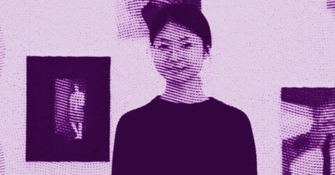 A stylized, purple-toned image of Zhang Nan with dark hair standing indoors. Two framed artworks are visible in the background on a wall, one showing a human silhouette. The image has a dotted, textured effect. © Illustration by Art Critic.
