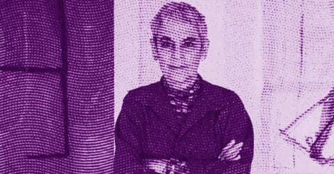 Mira Schor with short hair and glasses stands with arms crossed, facing the camera. The image is tinted purple with a dotted pattern overlay, and features abstract shapes in the background. © Illustration by Art Critic.