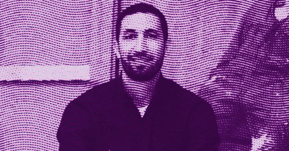 A stylized, purple-toned image of Bilal Hamdad with a beard sitting indoors. The image features wavy, dotted lines overlaying the entire scene, creating a textured and abstract effect. © Illustration by Art Critic.