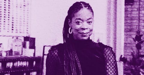 A stylized, purple-tinted image of Danielle Mckinney with long braids and hoop earrings, wearing a dark top, posing in front of urban skyscrapers. The image has a dotted, halftone effect. © Illustration by Art Critic.