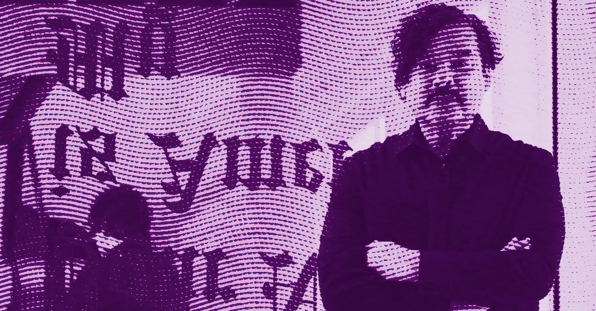 Julio César Morales stands with arms crossed in front of a wall with large, partially obscured text. The image is overlaid with a wavy, dotted pattern and tinted purple, creating a stylized, abstract effect. © Illustration by Art Critic.