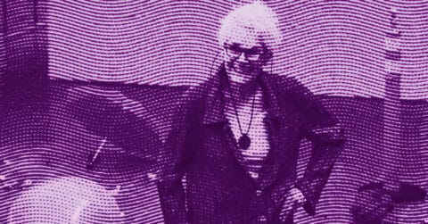 A stylized, purple-toned image of Alison Knowles standing with one hand on their hip, wearing a jacket and necklace, with wavy lines and dotted patterns overlaying the scene. © Illustration by Art Critic.