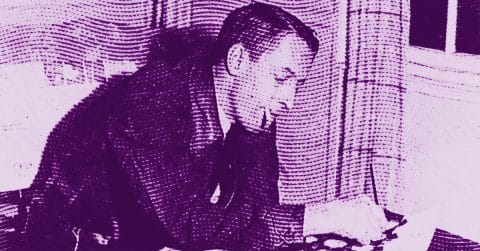 Edward Burra with short hair leans over a deskresting his chin on his hand while looking at papers. The image is heavily stylized in shades of purple with a dotted texture effect. © Illustration by Art Critic.